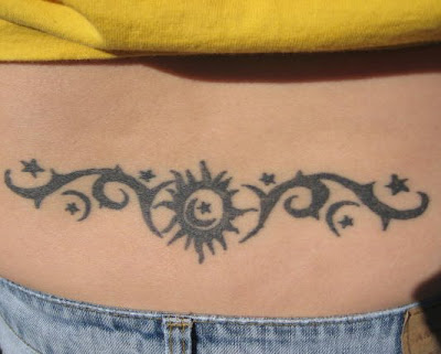 Tribal Moon and Star Tattoo in the Lower Back