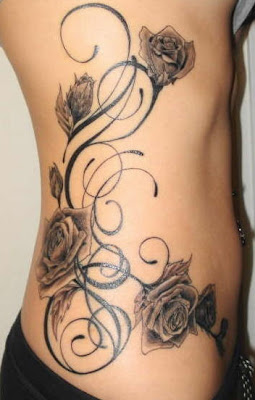 side tattoos,rose tattoo designs,vine tattoos
