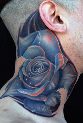Blue Dark Flower Tattoo Behind Ear