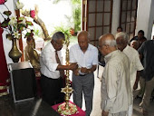 lighting of oil lamp by family members of martin wiremasinghe