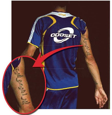 Marco Materazzi with a full tribal tattoos on arm tattoos and hand tattoos