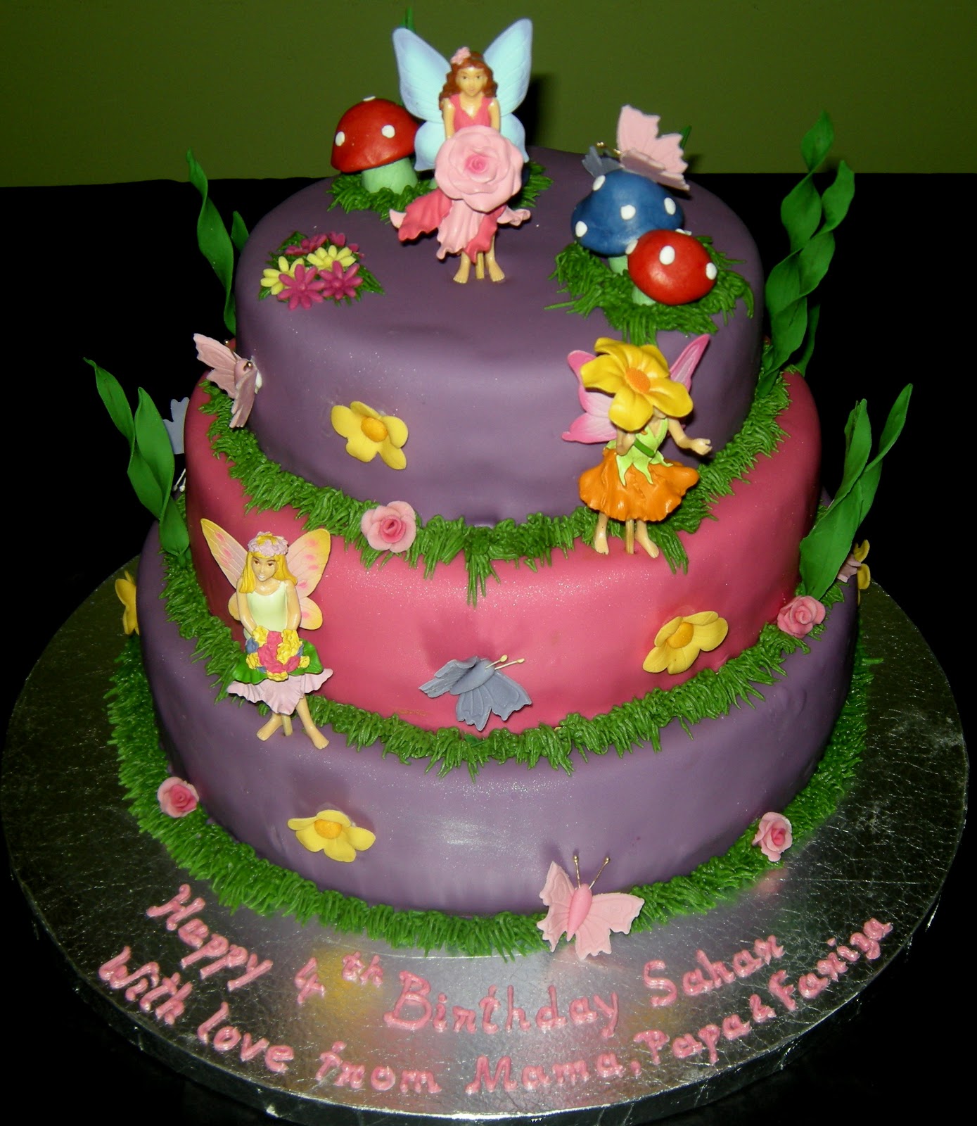 Harshi's Cakes & Bakes Three tier cake with fairies