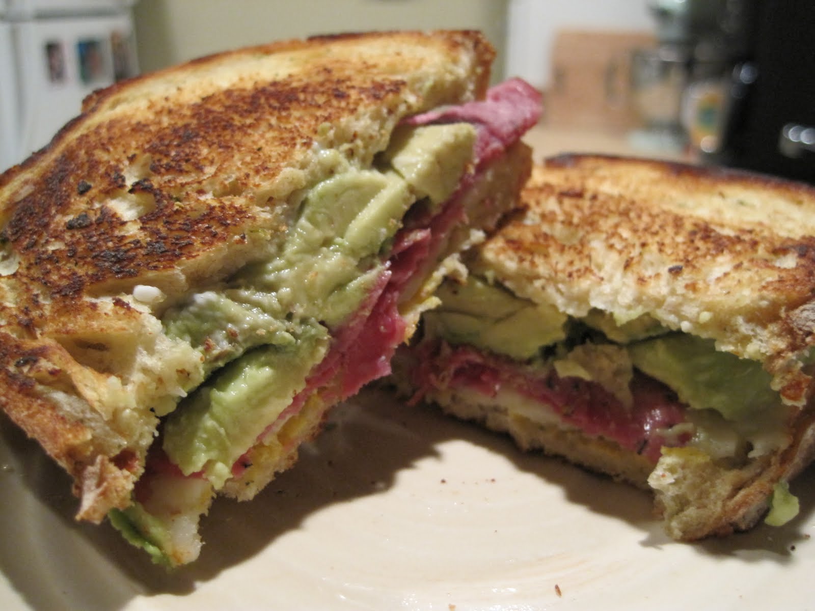 Table For Two .pastrami & avocado sandwich.