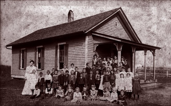 Guy, Mary & Bess in front of their one room schoolhouse, "The Blakeley School".