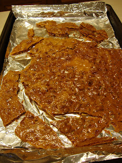 Peanut Brittle was never so easy than with this Microwave Peanut Brittle recipe. It takes less than 10 minutes and is so simple and quick! #WomenLivingWell #peanutbrittle #easyChristmascandy #holidayrecipes