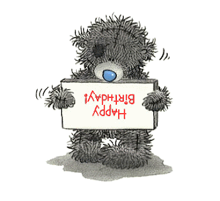 drawing of scruffy teddy bear with upside down happy birthday