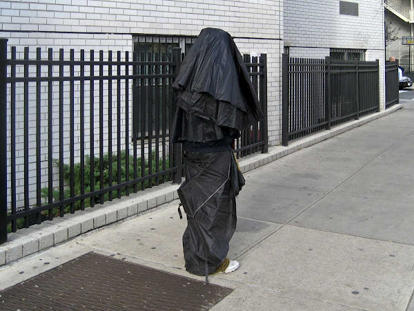 Mad Style 1 - Cloaked in umbrellas on 4th Ave. near 10th St.
