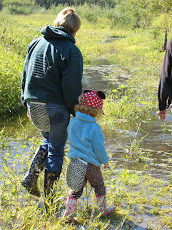 Red and Teacher on a hike to beaver dam