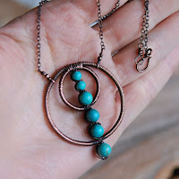 Copper Circles and Turquoise Wire Wrapped Necklace on Hand