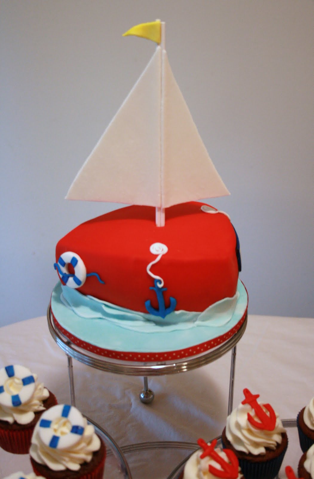 Sweet Elegance Baby Shower Sailboat Cake And Cupcakes