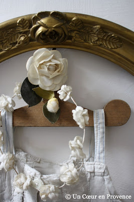 Old coat-hanger and bride wreath