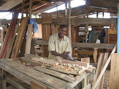 Carpenter Making Buswelu Desks