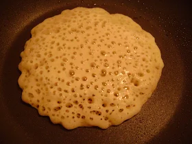 Image of pancake ready to turn in hot pan
