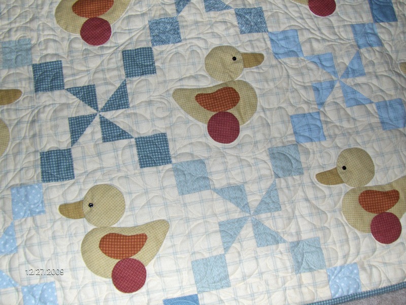 [Ducky+close+up+quilting+sm.jpg]