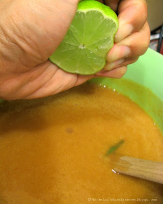 squeezing lime juice into peach puree