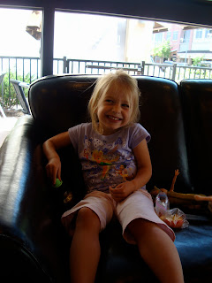 Child with toys sitting and smiling - 9