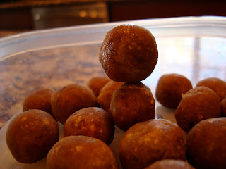 Stacked Vegan Peanut Butter Vanilla Balls in container