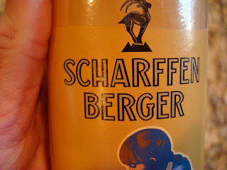 Hand holding Scharffen Berger product