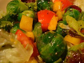 Salad topped with Vegan Holiday-Spice Orange Vinaigrette