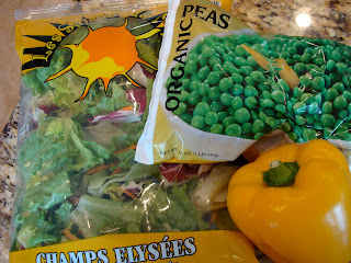 Mixed greens, peas and yellow pepper