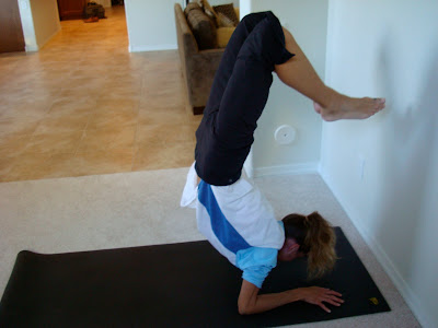 Woman doing Scorpion Pose yoga pose