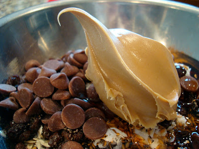 Ingredients for Vegan Peanut Butter Chocolate Chip Protein Bars in silver bowl