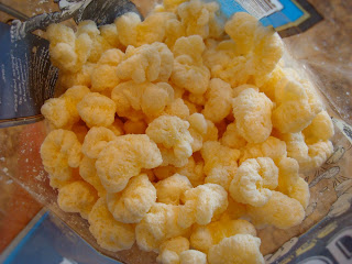 Inside bag of White Cheddar Corn Puffs