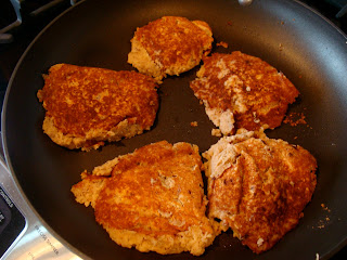 Pancakes being cooked in skillet