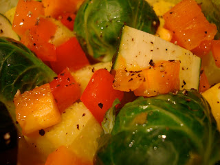 Raw Vegetables dressed in Holiday Orange Spice Vinaigrette Recipe and black pepper