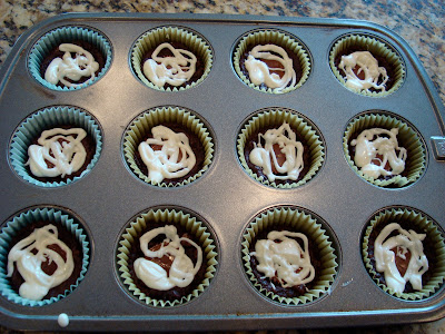 Iced Peanut Butter Cup Brownie Cupcakes in muffin tin