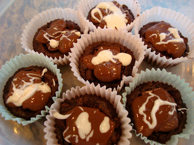 Peanut Butter Cup Brownie Cupcakes with Mint Chocolate Frosting & White Chocolate Drizzle in paper liners