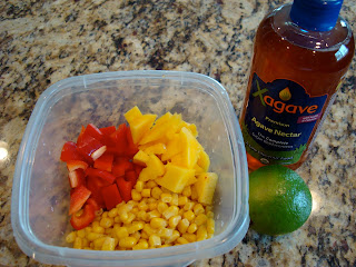 Ingredients to make Sweet Mango & Lime Corn Salsa in clear container