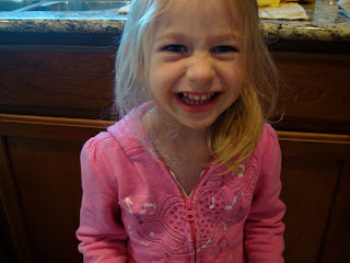 Young girl giving the biggest smile