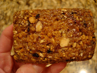 Hand holding Blueberry Clif Bar - 37