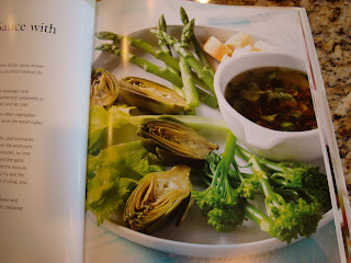 Page in book showing greens with dipping sauce