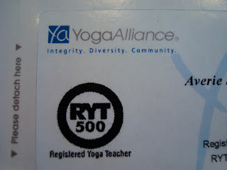 Close up of Yoga Alliance Yoga Teacher Card