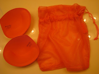 Removable bra inserts next to mesh bag