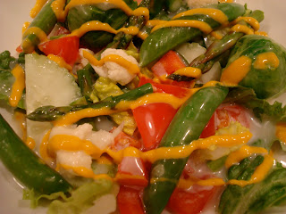 Green salad with vegetables drizzled with mustard