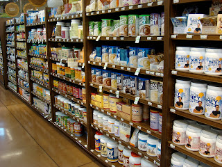 Shelves full of protein products 