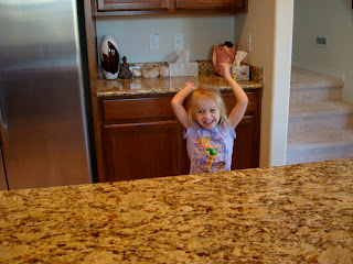 Little girl dancing in kitchen