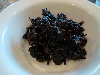 Finished Dark Chocolate Coconut Snowballs in white bowl