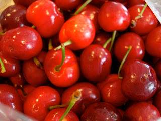 Fresh cherries in container