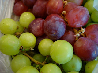 Close up of green and red grapes