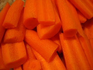 Slices of carrot sticks stacked on top of one another
