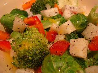 Raw vegetables dressed in a clear container - 3