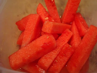 Sliced up watermelon in clear container - 15