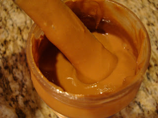 Tamper in jar of sunflower seed butter - 13