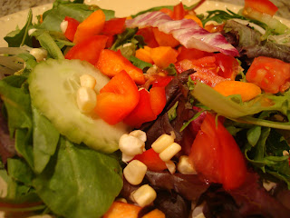 Green salad topped with mixed diced vegetables