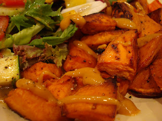 Roasted Sweet Potatoes and carrots drizzled with sweet hot mustard