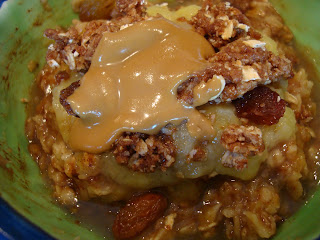 Oatmeal topped with brûlée, raisins  Raw Apple Crumble Topping crumble mixture and sunflower butter